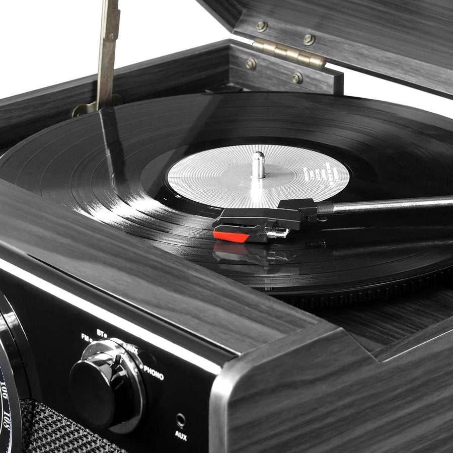 Close-up of a turntable with a vinyl record playing.